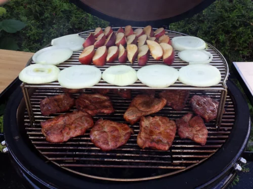 Pork, Onions, and Apple Slices Smoking on a Smoker