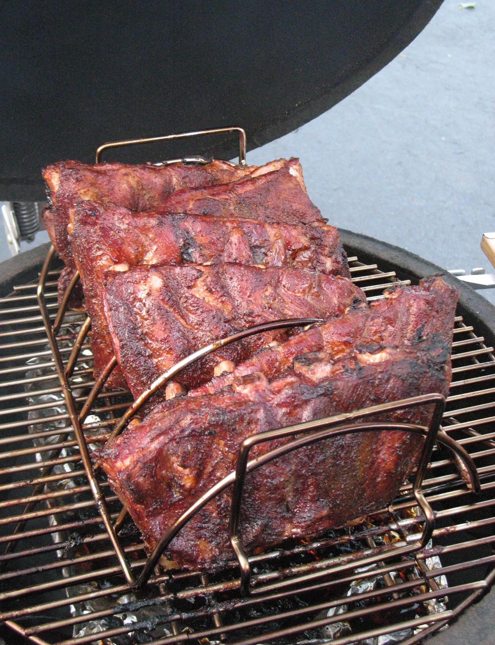 Ribs after being seared on a rib rack, using a Saffire kamado