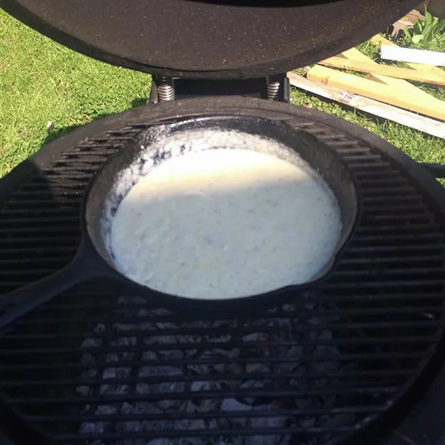 This homemade gravy was premixed, and now sits on the kamado grill to cook down and thicken
