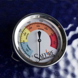 A temperature gauge showing heat ranges for smoking, roasting and searing, for premium kamado cooking