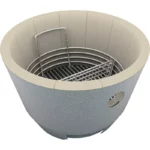 The Crucible Kamado Firebox lined with refractory brick and charcoal basket, for use in Saffire's premium kamado grills