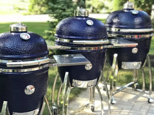 The medium, large, and extra large Saffire grills are all shown, lined up in a row