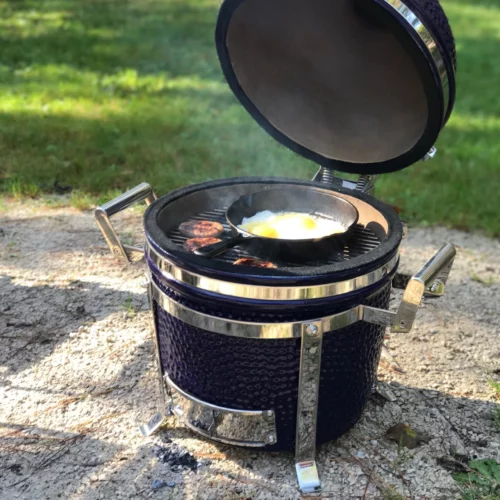 Making an egg omlette on the small blue Saffire grill.