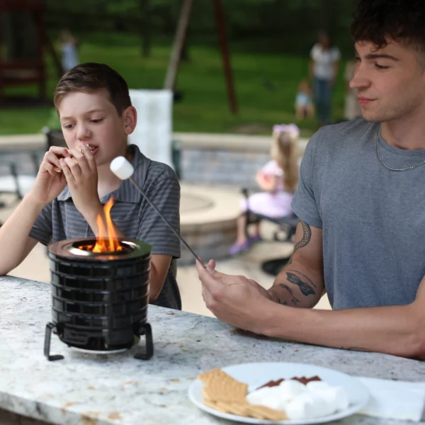 cousins-roasting-marshmallows-on-smokeless-tabletop-fire-pit