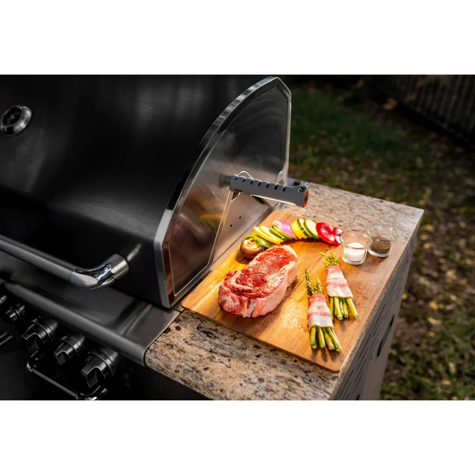 Nebo 300 Lumen Grill Light Detached From Clamp and Magnetically Attached To Grill