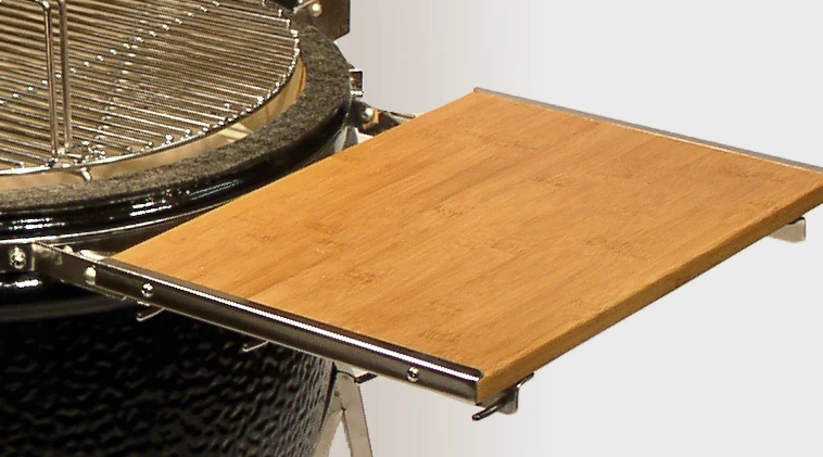 Bamboo side shelf of a grill.