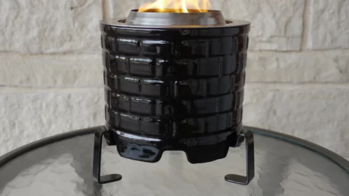 The Saffire smokeless tabletop fire pit on a table.